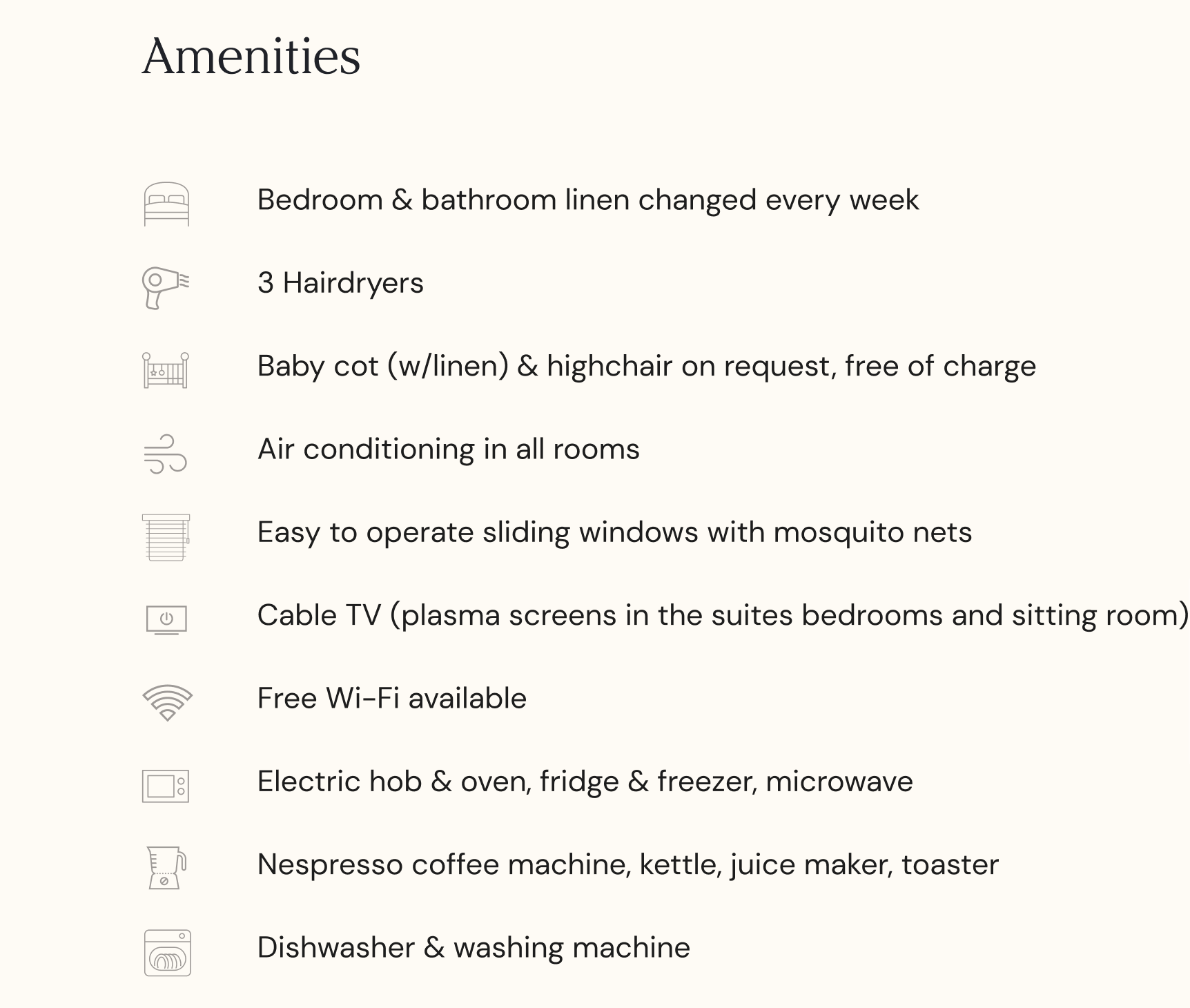 Person sitting on couch working on laptop